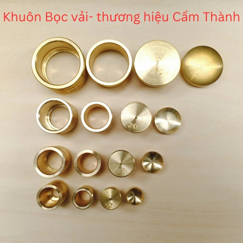khuôn đóng nút bọc vải