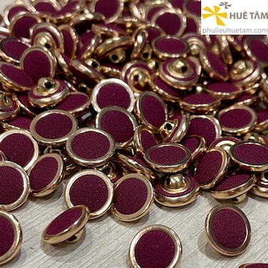 Nút bọc vải viền khoen